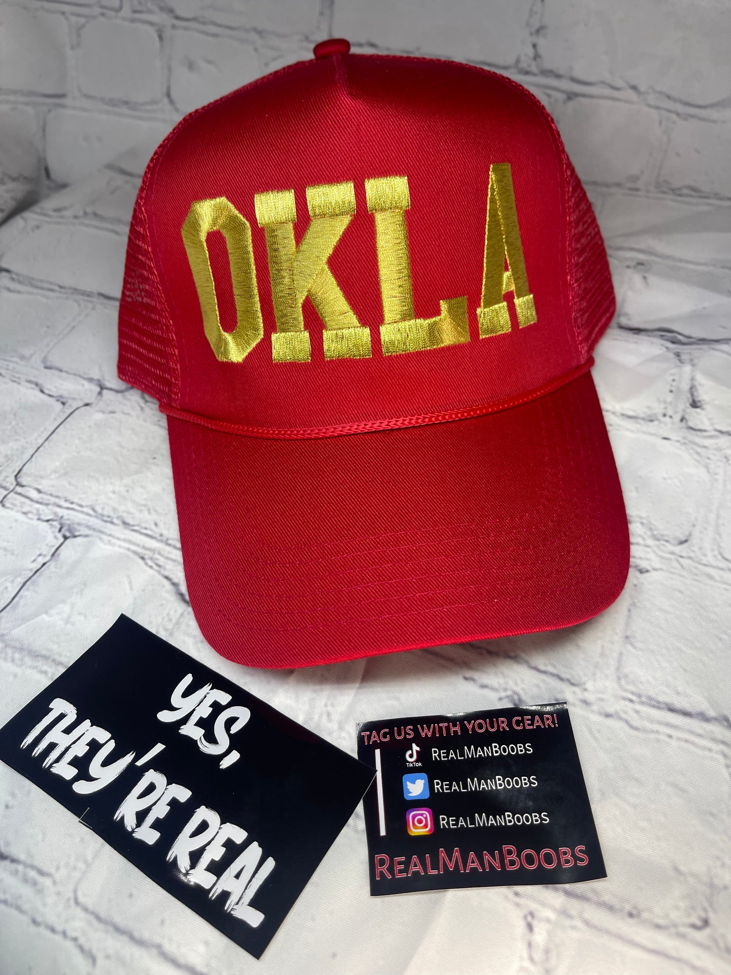 OKLA Gold Red trucker hat.